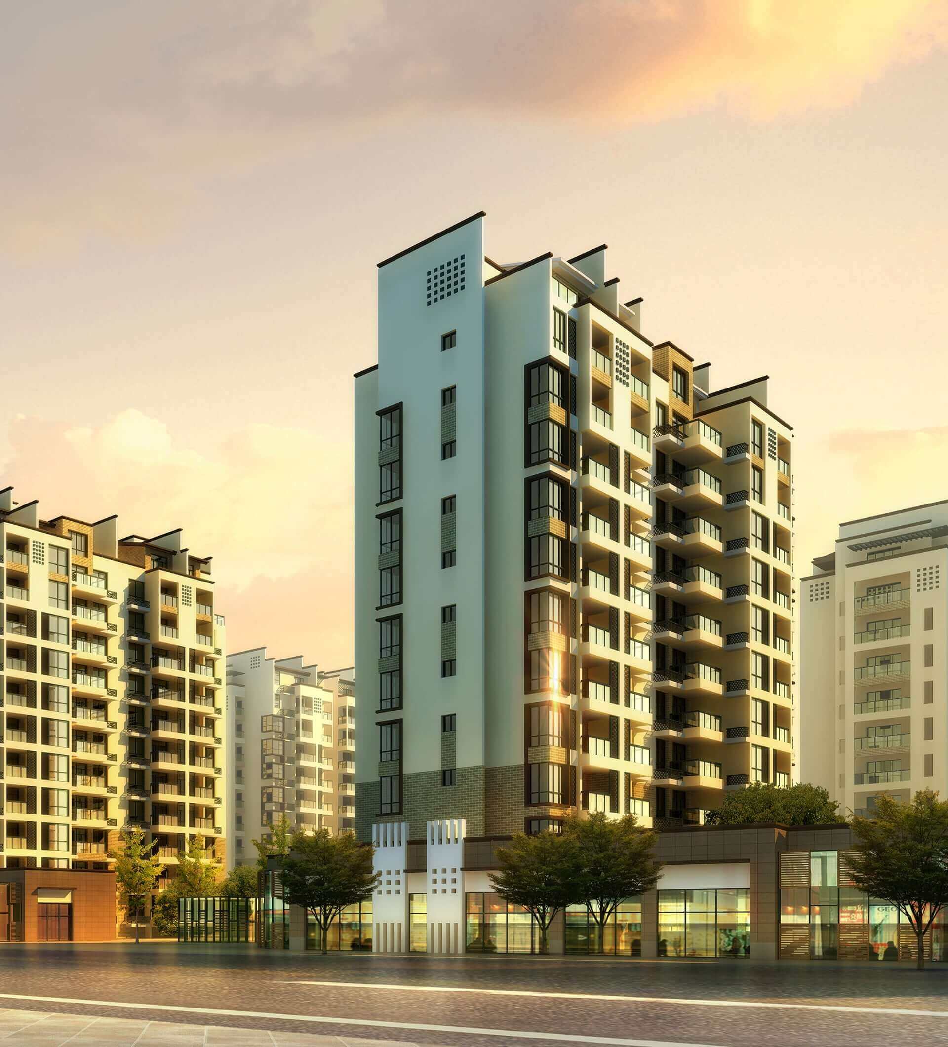 Modern apartment complex illuminated by golden sunset light.