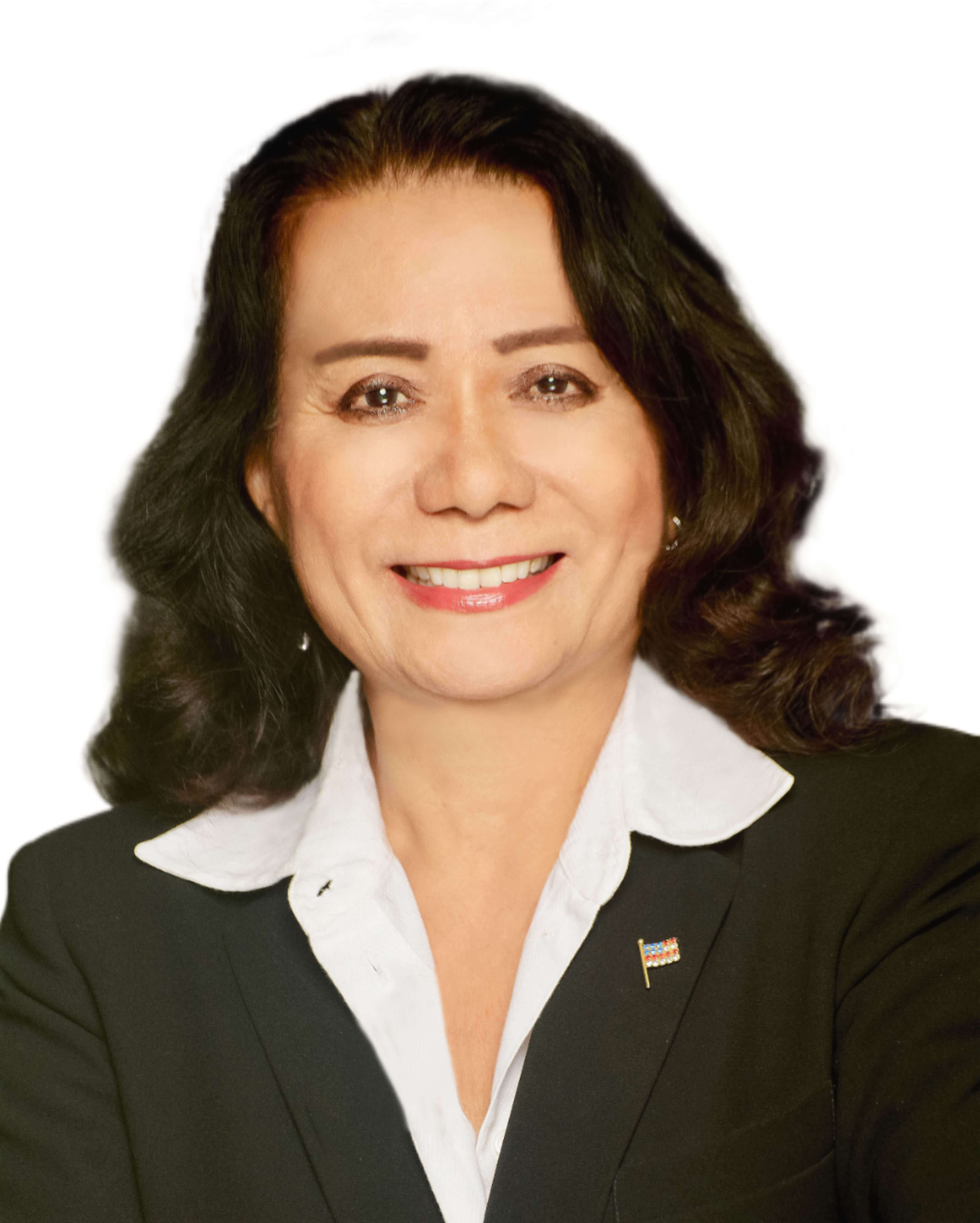 Professional woman with dark hair, wearing a black blazer and white shirt, smiling confidently.